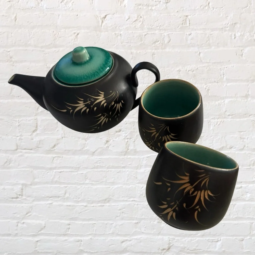 Carved Vietnamese tea kettle set with 2 small tea cups